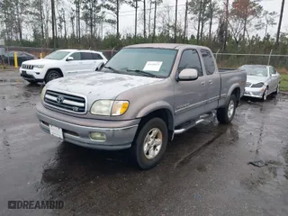 2001 Toyota Tundra Ltd with VIN 5TBBT48151S220102, listed as a IAAI auction lot 41628923 with 263,433 mi miles. Bid and sale history available at carsss.com. Image 2.