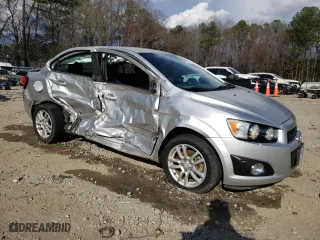 2014 Chevrolet Sonic LT with VIN 1G1JC5SH1E4195966, listed as a Copart auction lot 48574345 with 120,229 mi miles and Salvage Title. Bid and sale history available at carsss.com. Image 4.