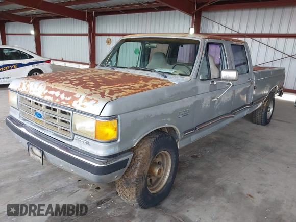1989 Ford F-350 with VIN 2FTJW35M9KCA56949, listed as a IAAI auction lot 42244693 with 81,044 mi miles and . Bid and sale history available at DreamBid. Image 2.