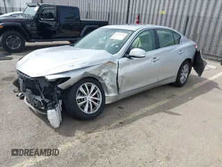 2017 Infiniti Q50 Premium z VIN JN1EV7AP5HM731123, wystawiony jako IAAI lot #41795396 z przebiegiem 151 948 mil mil oraz . Historia ofert i sprzedaży dostępna na DreamBid. Obrazek 17.