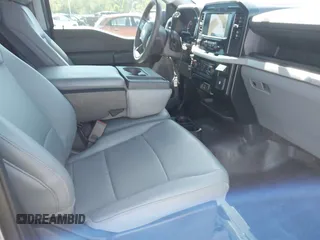 2023 Ford F-150 XL with VIN 1FTNF1E5XPKF47161, listed as a IAAI auction lot 42171620 with 14,623 mi miles and . Bid and sale history available at DreamBid. Image 5.