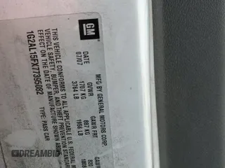 2007 Pontiac G5 z VIN 1G2AL15FX77395082, wystawiony jako Copart lot #56042275 z przebiegiem 150 552 mil mil oraz Szkody całkowita. Historia ofert i sprzedaży dostępna na DreamBid. Obrazek 12.