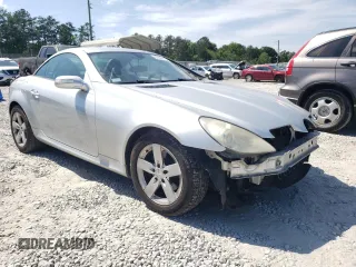 2007 Mercedes-Benz SLK 280 with VIN WDBWK54F47F158590, listed as a Copart auction lot 57837415 with 128,259 mi miles and Salvage title. Bid and sale history available at DreamBid. Image 4.