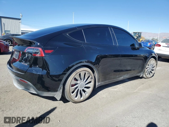 2023 Tesla Model Y Performance with VIN 7SAYGDEF8PF925238, listed as a Copart auction lot 46276925 with 28,201 mi miles and Salvage Title. Bid and sale history available at DreamBid. Image 3.