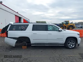 2016 Chevrolet Suburban LT with VIN 1GNSKHKC5GR468635, listed as a IAAI auction lot 41735340 with 102,795 mi miles and . Bid and sale history available at DreamBid. Image 14.