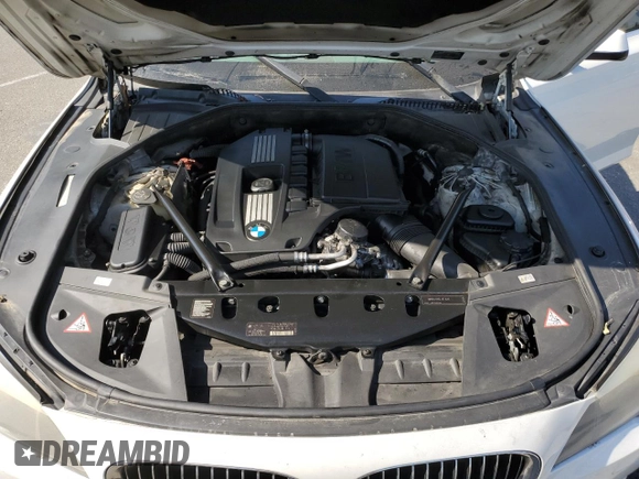 2012 BMW 7 Series 740Li with VIN WBAKB4C55CC575826, listed as a Copart auction lot 74012564 with 140,577 mi miles and Salvage Title. Bid and sale history available at carsss.com. Image 13.