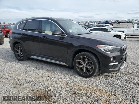 2019 BMW X1 xDrive28i with VIN WBXHT3C53K5N27090, listed as a Copart auction lot 54150485 with 79,835 mi miles and Salvage title. Bid and sale history available at DreamBid. Image 4.