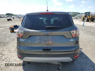 2017 Ford Escape SE z VIN 1FMCU0GD2HUA57505, wystawiony jako Copart lot #54814185 z przebiegiem 121 540 mil mil oraz Szkoda całkowita • Salvage title. Historia ofert i sprzedaży dostępna na DreamBid. Obrazek 6.