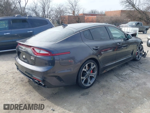 2021 Kia Stinger GT2 with VIN KNAE55LC0M6088347, listed as a IAAI auction lot 41503919 with 113,823 mi miles. Bid and sale history available at carsss.com. Image 4.