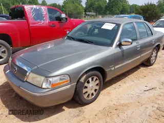 2003 Mercury Grand Marquis LS Premium z VIN 2MEHM75WX3X704496, wystawiony jako IAAI lot #42257767 z przebiegiem 200 885 mil mil oraz . Historia ofert i sprzedaży dostępna na DreamBid. Obrazek 2.