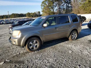 2011 Honda Pilot EX-L with VIN 5FNYF3H64BB032658, listed as a Copart auction lot 88302005 with 243,959 mi miles and Salvage Title. Bid and sale history available at carsss.com. Image 1.