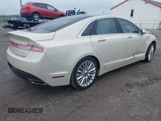 2015 Lincoln MKZ with VIN 3LN6L2JK9FR622100, listed as a IAAI auction lot 42269664 with 52,287 mi miles and . Bid and sale history available at DreamBid. Image 4.
