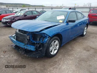2023 Dodge Charger SXT with VIN 2C3CDXBGXPH674476, listed as a IAAI auction lot 41910339 with 14,079 mi miles. Bid and sale history available at carsss.com. Image 2.