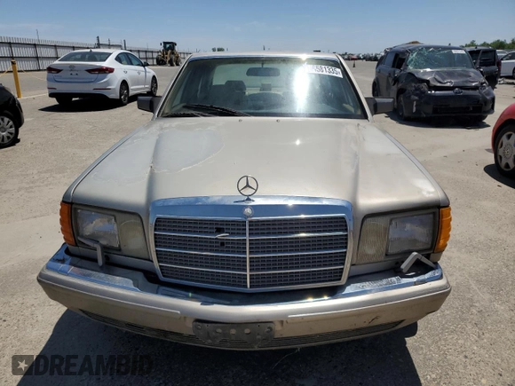 1990 Mercedes-Benz 300 with VIN WDBCA24D1LA529716, listed as a Copart auction lot 56581335 with 122,286 mi miles and Salvage Title. Bid and sale history available at DreamBid. Image 5.