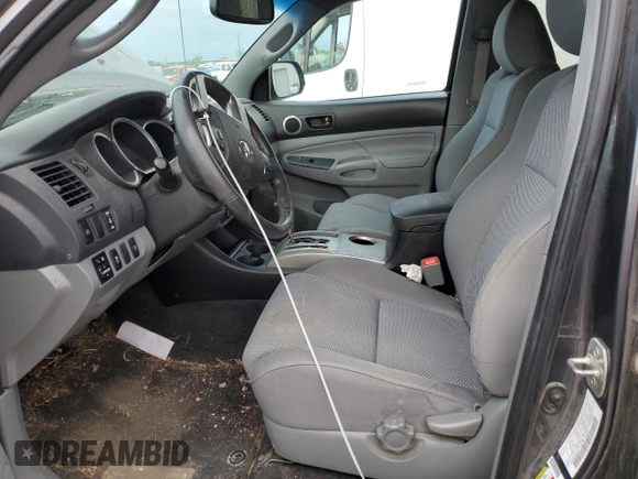 2012 Toyota Tacoma with VIN 3TMLU4EN0CM094637, listed as a Copart auction lot 55335095 with 131,645 mi miles and Salvage title. Bid and sale history available at DreamBid. Image 7.