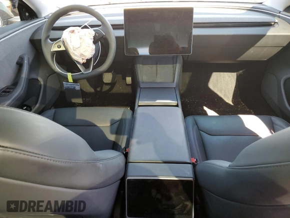2025 Tesla Model 3 Long Range with VIN 5YJ3E1EA1SF878806, listed as a Copart auction lot 50427005 with 9,790 mi miles and Salvage Title. Bid and sale history available at DreamBid. Image 8.