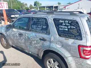 2010 Ford Escape XLT with VIN 1FMCU0D7XAKD16869, listed as a IAAI auction lot 41884141 with 145,781 mi miles. Bid and sale history available at carsss.com. Image 13.