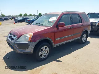 2002 Honda CR-V EX with VIN JHLRD78892C094415, listed as a IAAI auction lot 42406205 with 218,279 mi miles and . Bid and sale history available at DreamBid. Image 2.