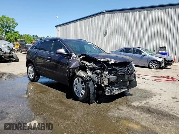2015 Cadillac SRX Luxury Collection z VIN 3GYFNBE36FS606313, wystawiony jako Copart lot #52767735 z przebiegiem 91 480 mil mil oraz Szkody całkowita. Historia ofert i sprzedaży dostępna na DreamBid. Obrazek 14.