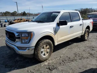 2023 Ford F-150 XL with VIN 1FTFW1E59PKE35312, listed as a Copart auction lot 86181444 with 19,849 mi miles and Salvage Title. Bid and sale history available at carsss.com. Image 1.