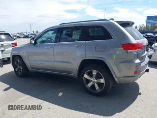2014 Jeep Grand Cherokee Overland with VIN 1C4RJECG0EC291048, listed as a IAAI auction lot 41883941 with 81,871 mi miles. Bid and sale history available at carsss.com. Image 14.