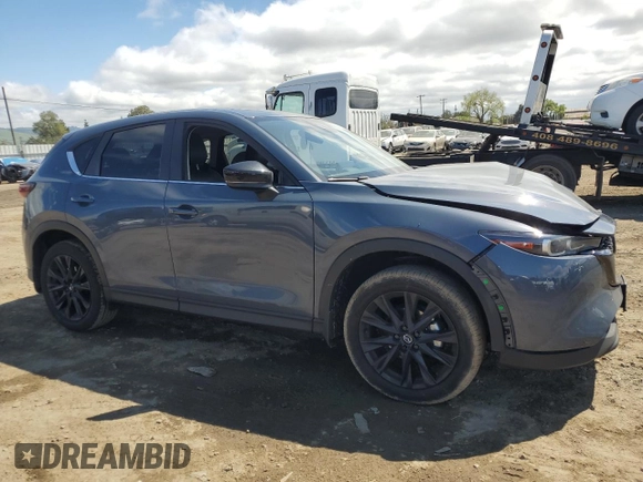 2024 Mazda CX-5 2.5 S Carbon Edition with VIN JM3KFBCL6R0422979, listed as a Copart auction lot 50939695 with 9,974 mi miles and Salvage Title. Bid and sale history available at carsss.com. Image 4.