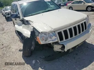 2005 Jeep Grand Cherokee Laredo with VIN 1J4GR48K05C625144, listed as a Copart auction lot 57477275 with 167,654 mi miles and Salvage title. Bid and sale history available at DreamBid. Image 14.