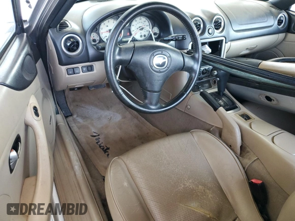 2004 Mazda MX-5 Miata LS z VIN JM1NB353X40404238, wystawiony jako Copart lot #61601895 z przebiegiem 110 549 mil mil oraz Szkoda całkowita • Salvage title. Historia ofert i sprzedaży dostępna na DreamBid. Obrazek 8.