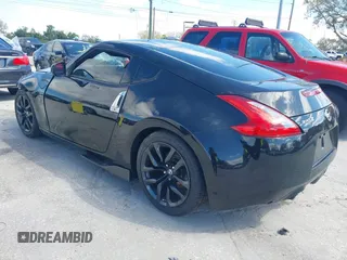 2017 Nissan 370Z with VIN JN1AZ4EH5HM954458, listed as a IAAI auction lot 41629907 with 113,606 mi miles. Bid and sale history available at carsss.com. Image 3.