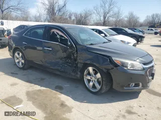 2014 Chevrolet Malibu LTZ with VIN 1G11J5SX9EF165261, listed as a Copart auction lot 48725055 with 40,058 mi miles and Salvage Title. Bid and sale history available at carsss.com. Image 4.