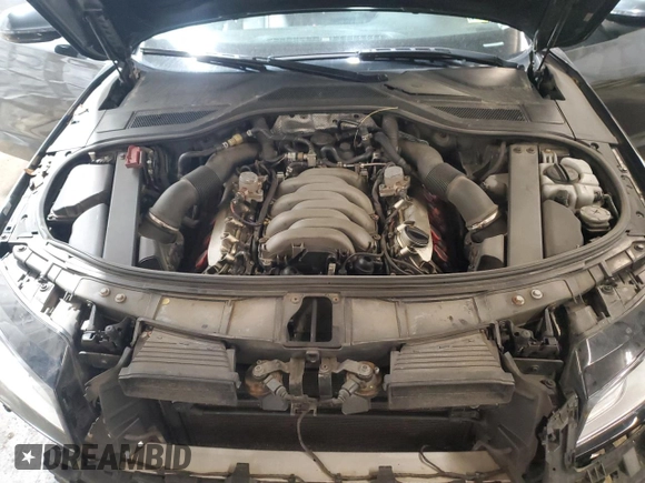 2011 Audi A8 z VIN WAURVAFD7BN006275, wystawiony jako Copart lot #58306205 z przebiegiem 190 383 mil mil oraz Szkody całkowita. Historia ofert i sprzedaży dostępna na DreamBid. Obrazek 11.