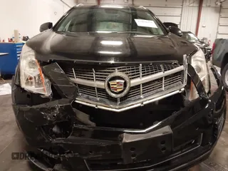 2011 Cadillac SRX Luxury Collection with VIN 3GYFNDEY3BS675672, listed as a IAAI auction lot 41804978 with 148,136 mi miles. Bid and sale history available at carsss.com. Image 6.
