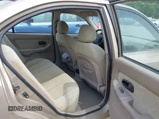2003 Hyundai Elantra GLS z VIN KMHDN45D73U556305, wystawiony jako IAAI lot #42478211 z przebiegiem 149 648 mil mil oraz . Historia ofert i sprzedaży dostępna na DreamBid. Obrazek 8.
