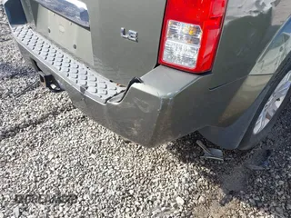 2005 Nissan Pathfinder SE with VIN 5N1AR18U45C740630, listed as a IAAI auction lot 41597662 with 267,781 mi miles. Bid and sale history available at carsss.com. Image 6.
