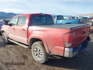 2018 Toyota Tacoma SR with VIN 3TMCZ5AN2JM134145, listed as a IAAI auction lot 41124645 with 61,302 mi miles. Bid and sale history available at carsss.com. Image 3.