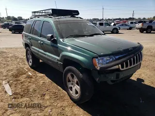 1999 Jeep Grand Cherokee Limited with VIN 1J4GW68SXXC581130, listed as a Copart auction lot 43532245 with 265,886 mi miles and Salvage Title. Bid and sale history available at carsss.com. Image 11.