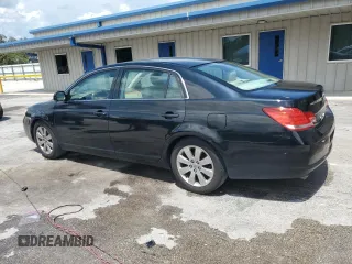 2005 Toyota Avalon XL z VIN 4T1BK36B05U022928, wystawiony jako Copart lot #59137785 z przebiegiem 146 854 mil mil oraz Szkoda całkowita • Salvage title. Historia ofert i sprzedaży dostępna na DreamBid. Obrazek 2.