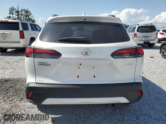 2022 Toyota Corolla Cross XLE с VIN 7MUDAAAG1NV023474, выставлен на аукционе Copart как лот 58534475 с пробегом 7 125 миль миль и Списание • Salvage title. История ставок и продаж доступна на DreamBid. Изображение 6.