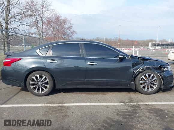 2016 Nissan Altima SR with VIN 1N4AL3AP3GC292783, listed as a IAAI auction lot 41876267 with 128,013 mi miles and . Bid and sale history available at carsss.com. Image 13.