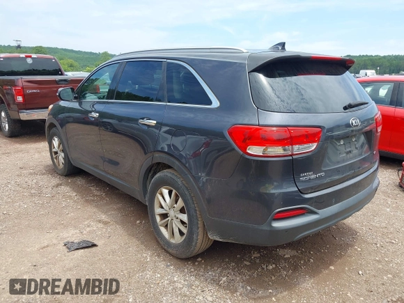 2017 Kia Sorento LX with VIN 5XYPG4A56HG230935, listed as a IAAI auction lot 42593196 with 127,425 mi miles and . Bid and sale history available at DreamBid. Image 3.