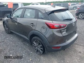 2017 Mazda CX-3 Touring z VIN JM1DKFC79H0162745, wystawiony jako IAAI lot #42318637 z przebiegiem 68 465 mil mil oraz . Historia ofert i sprzedaży dostępna na DreamBid. Obrazek 3.