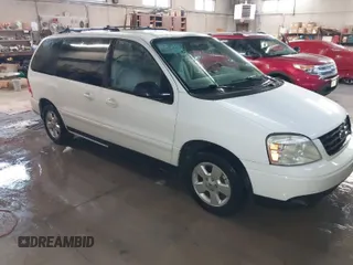2005 Ford Freestar SES с VIN 2FMZA57695BA87443, выставлен на аукционе IAAI как лот 40873184 с пробегом 144 558 миль миль и . История ставок и продаж доступна на DreamBid. Изображение 1.
