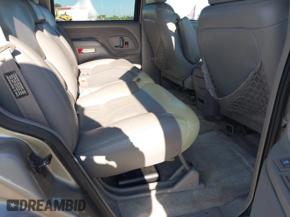 1999 Chevrolet Tahoe Z71 with VIN 1GNEK13R7XJ521373, listed as a IAAI auction lot 42131893 with 250,712 mi miles and . Bid and sale history available at DreamBid. Image 8.