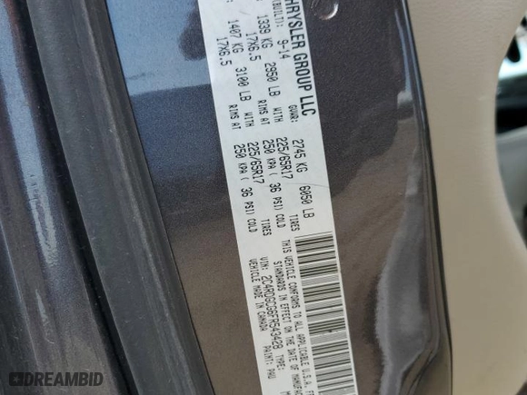 2015 Dodge Grand Caravan SXT with VIN 2C4RDGCG6FR543428, listed as a Copart auction lot 50823115 with 127,659 mi miles and Salvage Title. Bid and sale history available at carsss.com. Image 13.