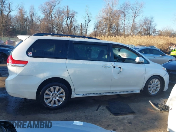 2012 Toyota Sienna XLE with VIN 5TDDK3DCXCS032344, listed as a IAAI auction lot 41205400 with 105,274 mi miles. Bid and sale history available at carsss.com. Image 14.