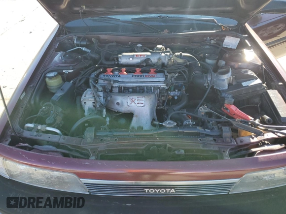 1990 Toyota Camry z VIN JT2SV21E7L3411990, wystawiony jako Copart lot #88557555 z przebiegiem 335 803 mil mil oraz Szkoda całkowita • Salvage title. Historia ofert i sprzedaży dostępna na DreamBid. Obrazek 11.
