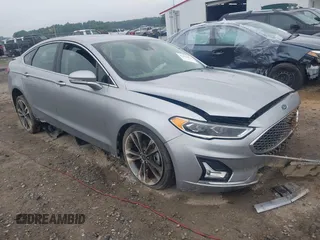 2020 Ford Fusion Titanium with VIN 3FA6P0D99LR138127, listed as a IAAI auction lot 42439024 with 128,792 mi miles and . Bid and sale history available at DreamBid. Image 1.