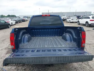 2004 Dodge 1500 SLT with VIN 1D7HA18D84S529788, listed as a IAAI auction lot 42006080 with 153,312 mi miles. Bid and sale history available at carsss.com. Image 17.