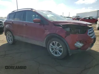 2018 Ford Escape SE z VIN 1FMCU9GD0JUC29279, wystawiony jako Copart lot #54511595 z przebiegiem 77 547 mil mil oraz Czysty tytuł • Clean title. Historia ofert i sprzedaży dostępna na DreamBid. Obrazek 4.