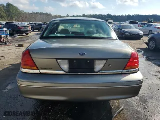 2000 Ford Crown Victoria with VIN 2FAFP73W0YX173874, listed as a Copart auction lot 82113564 with 108,425 mi miles and Salvage Title. Bid and sale history available at carsss.com. Image 6.